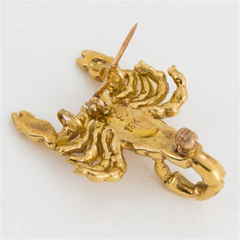 18K gold scorpion brooch/pendant. - Bukowskis