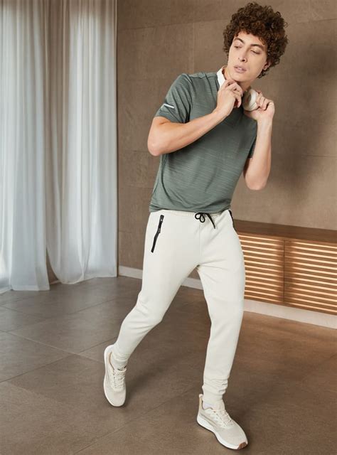 Buy Men Textured Sports T-shirt Online at just Rs. 799.0 ...