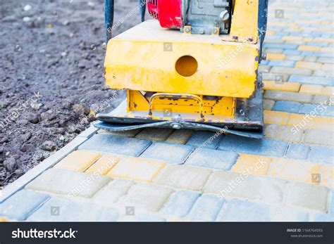 Using Plate Compactor On Pavers 的图像结果