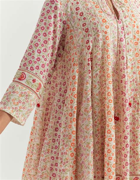 Multi colored cotton short paneled kurta with all-over small ditsy flo ...