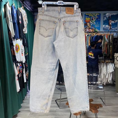 Vintage 90s Levi's 570 light wash blue denim jeans... - Depop