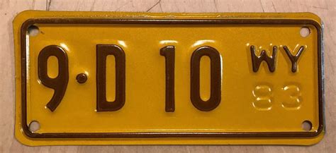 MINT ! 1983 WYOMING MOTORCYCLE CYCLE DLR LICENSE PLATE " 9 D 10 " WY 83 ...