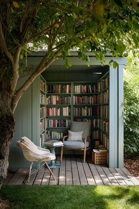 https://kisaf.com/wp-content/uploads/2024/06/Cozy-outdoor-library-corner-with-a-weatherproof-bookshelf-filled-with-books-a-comfortable-chair-and-a-small-table-all-set-under-a-shady-tree.jpg