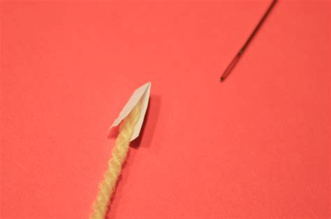 Image result for How to Thread a Needle Point Needle Using Yarn