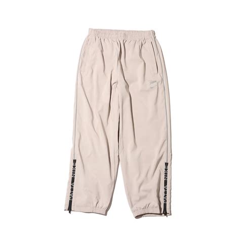 NIKE AS M NRG PATTA PANT SANDDRIFT/CREAM II （ナイキ NRG PA パンツ-ホワイト ...