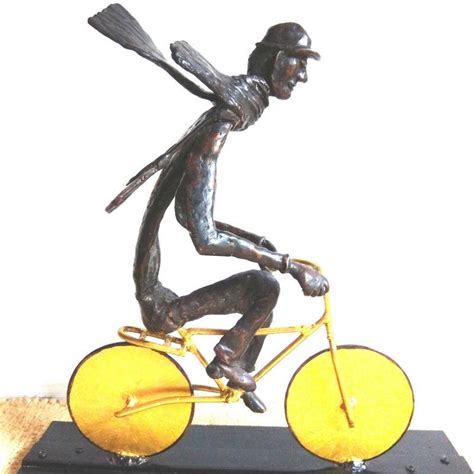 "The Bicycle Rider": Brown Sculpture by Usha Ramachandran | ArtZolo.com