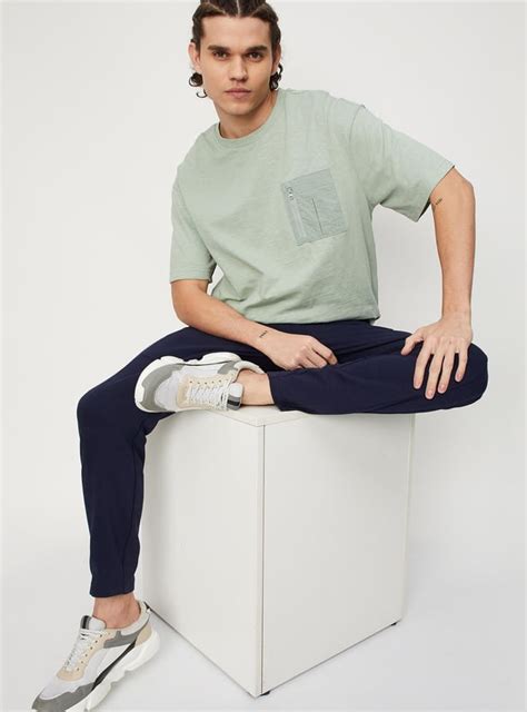 Buy Men Solid Oversized Athleisure T-shirt Online at just Rs. 599.0 ...