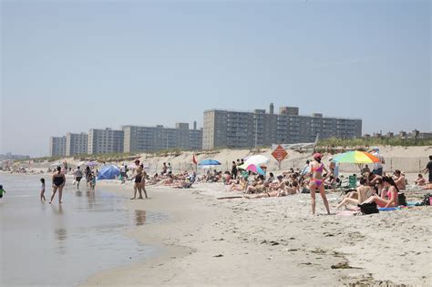 New Yorkers hit the beach as near-record temps scorch city