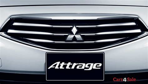 Image showing the Attrage badge on the Mitsubishi sedan. Mitsubishi ...