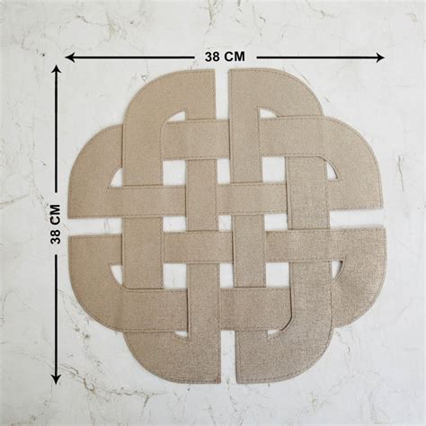 Buy Foliage Strap Knotted Placemat from Home Centre at just INR 599.0