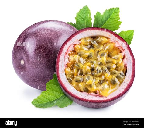Purple passion fruit and half of it with yellow seedy flesh. Isolated ...