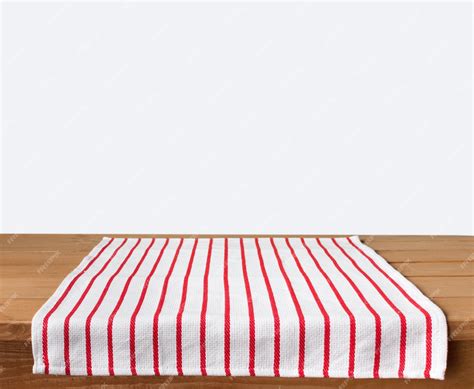 Premium Photo | Red cloth napkin on table top