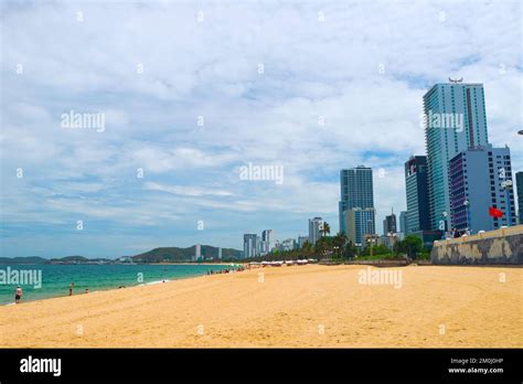 Photograph of Nha Trang beach with many high rise buildings behind it