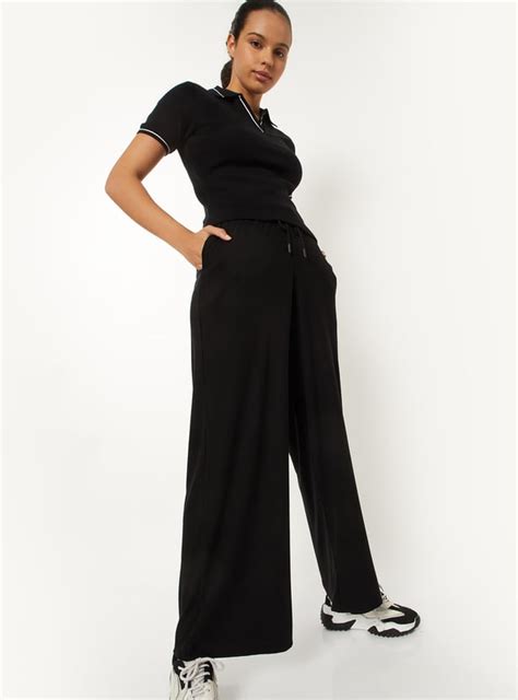 Buy Women Ribbed Wide Leg Track Pants Online at just Rs. 999.0 ...
