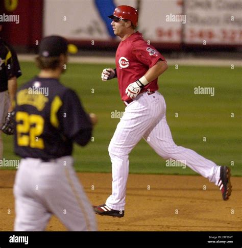 Cincinnati Reds' Adam Dunn trots past Pittsburgh Pirates pitcher Ryan ...