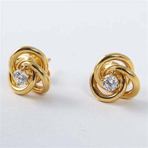 Pair of Tiffany and Co 18 Karat Yellow Gold Love Knot Diamond Earrings ...