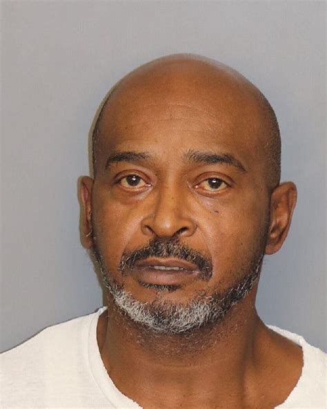 Armed man surrenders, charged after standoff with authorities in ...