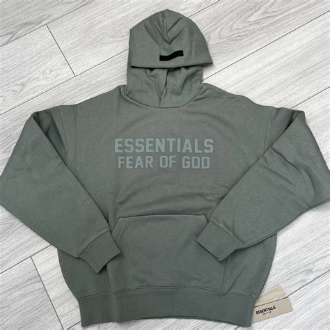 Fear of god essentials hoodie sycamore | Back to school essentials ...