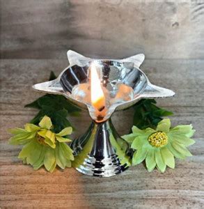 Surprises In Store Diya | Silver Plated Diya | Home And Temple Decor ...