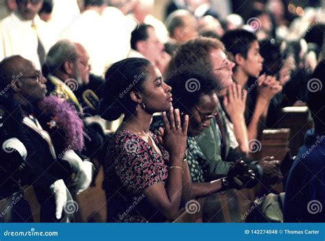 Man Praying In Church Holding Prayer Beads Royalty-Free Stock Photo ...