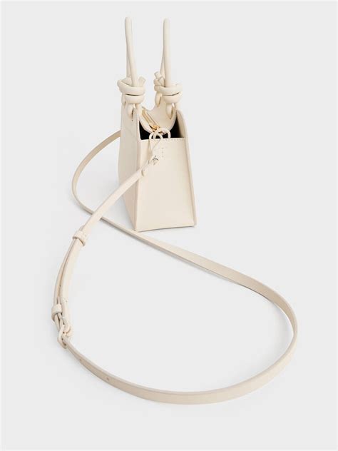 Cream Sabine Knotted-Handle Trapeze Tote Bag - Cream - CHARLES & KEITH IN