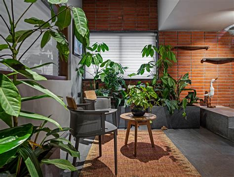 Intricate jali work and brick ground the design of this Bangalore home ...