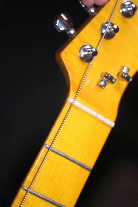 Image result for Guitar String Install Simple