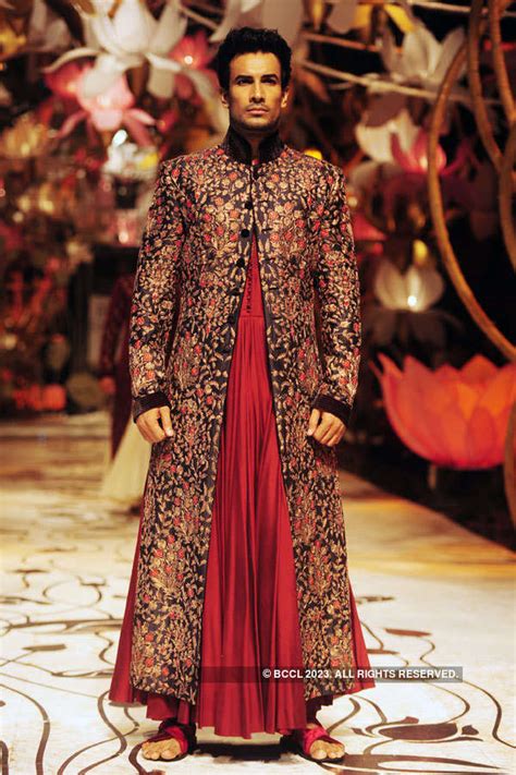 A model showcases a creation by designer Rohit Bal at India Bridal ...