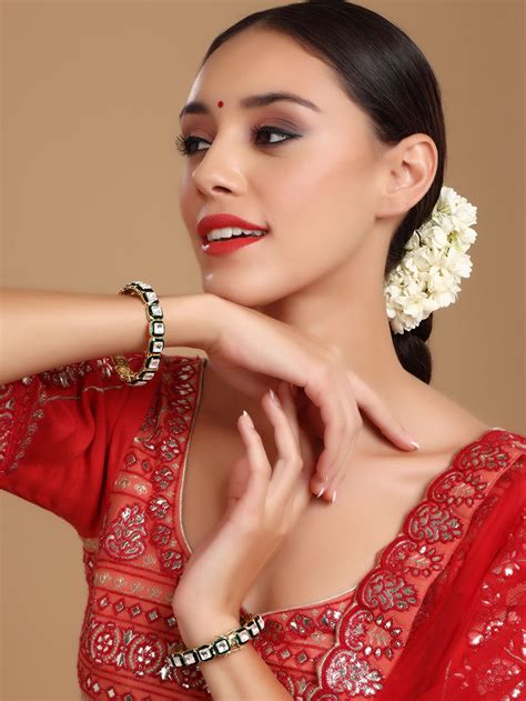 Gold Toned Handcrafted Brass Kundan Passa