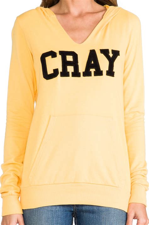 Local Celebrity Cray Crosby Hoodie in Gold | REVOLVE