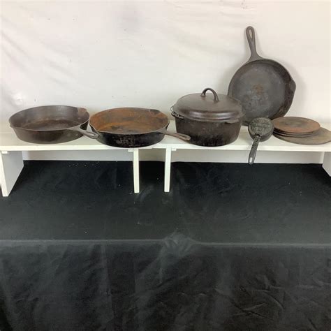 Lot.6442. Cast Iron Cooking set | EstateSales.org