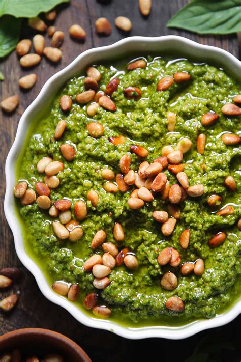 homemade basil pesto with pine nuts on top in 2025 | Creamy pesto ...
