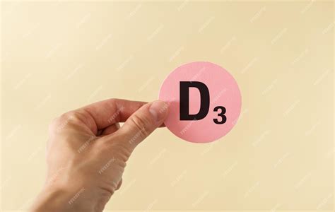 Premium Photo | D3 text on yellow round card in hand on yellow ...