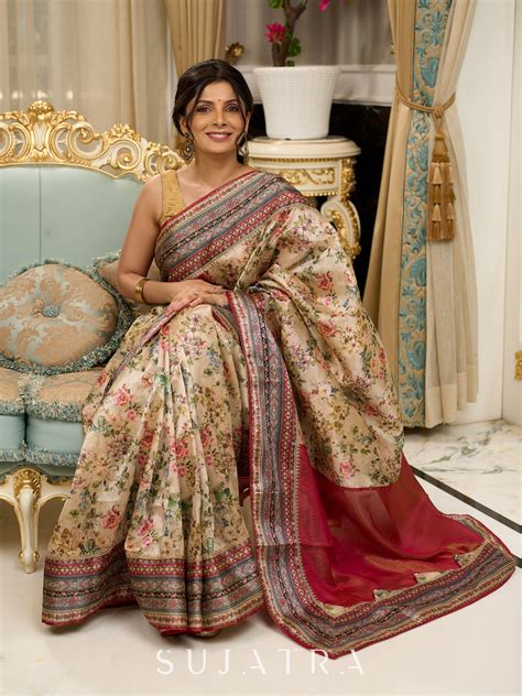 Graceful floral printed saree with intricate border, ideal for wedding ...