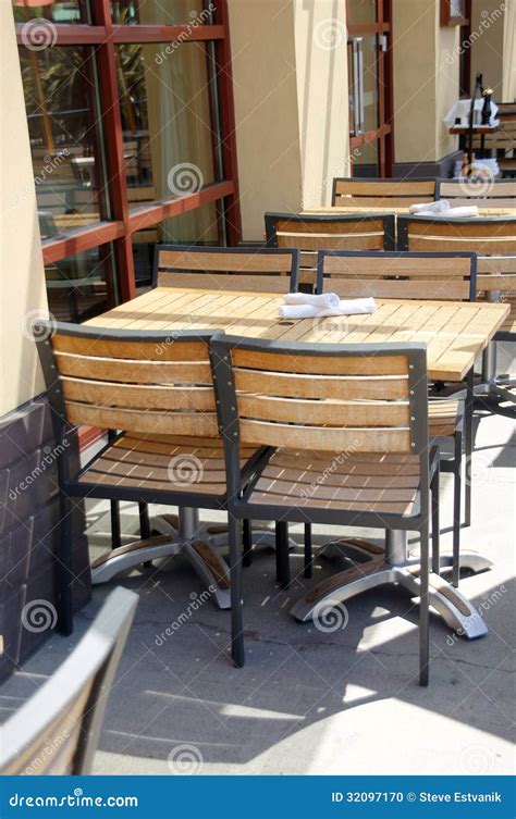 Wooden Tables and Chairs in Outdoor Restaurant Stock Photo - Image of ...