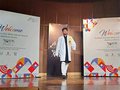 Doctors at a Delhi hospital walk the ramp donning hand painted lab ...