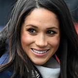 Meghan Markle is all smiles in new photo with friend as she celebrates ...
