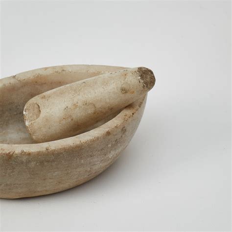A nest of marble mortars & pestle - Béton Brut