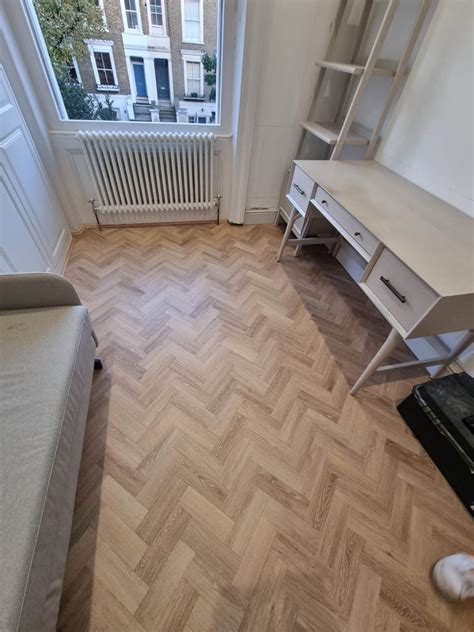 Amtico Spacia Muted Oak installation in Camden | The Flooring Group