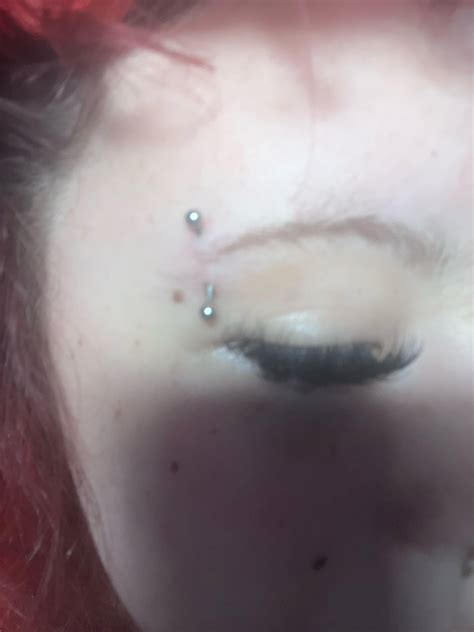 Is my eyebrow infected? : r/piercing