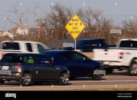 A road sign warns of possible icy road conditions on the President ...