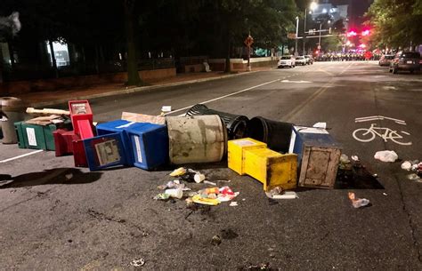 Police warn of arrests after protesters attempt to camp out, block off ...