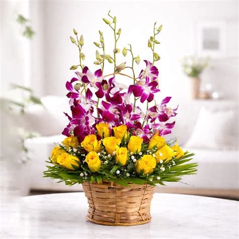 Buy / Send Basket of Yellow Roses with Orchids Online from OyeGifts