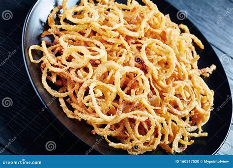 Close-up of French Crispy Fried Spicy Onions Stock Photo - Image of ...
