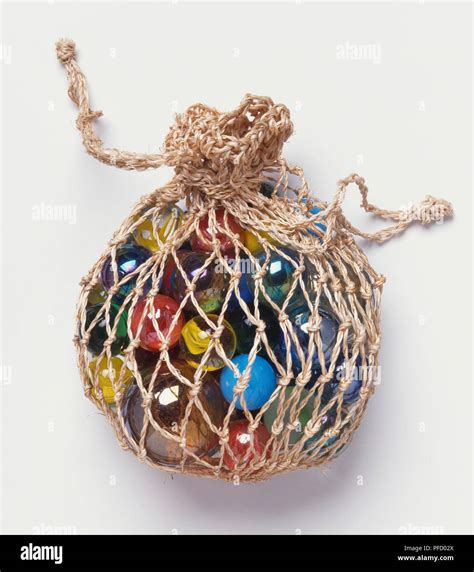 Bag of marbles hi-res stock photography and images - Alamy