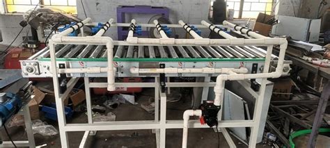 Roller Conveyor - SS roller Chain Conveyor Manufacturer from Coimbatore