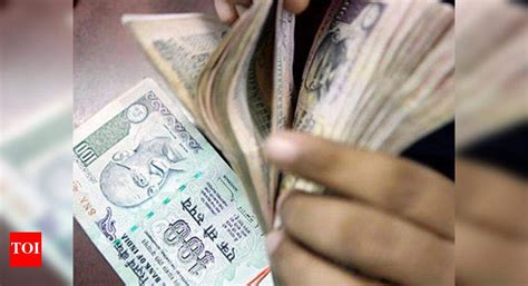 Rupee trims early gains, down 2 paise at 68.20 - Times of India