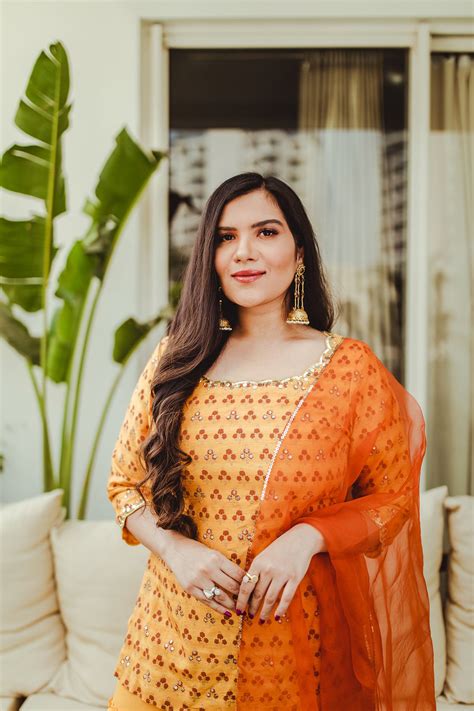 Pupul Pachauri In Saffron Silk Tiered Sharara Set – Ivory by Dipika