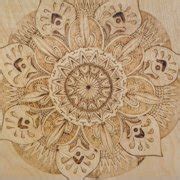 Buy Detail of mandala wood burning art by Jessica Moffatt / Design Pics ...
