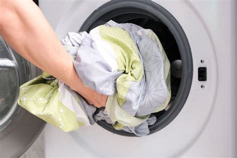 Woman S Hand Pick Up Clothes Washing Machine. Clean and Healthy ...